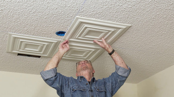 install peel and stick ceiling tiles